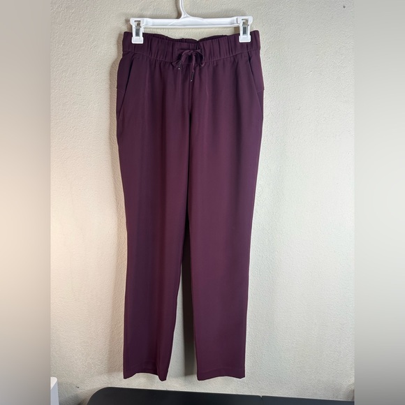 Lululemon On The Fly Pant Woven 27" size 4 maroon - Picture 2 of 6